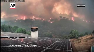 Cameras capture the scene in Spain as country battles historic wildfires