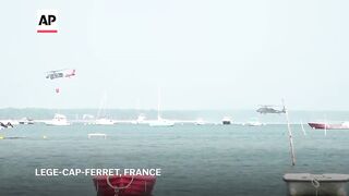 Helicopters collect seawater to aid battle against wildfires in France