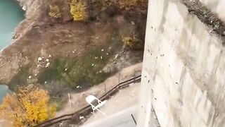 Sitting on the Edge of Nowhere: Extreme Cliff Stunt
