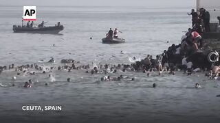 Spain deploys military to Ceuta after thousands breach Morocco’s border