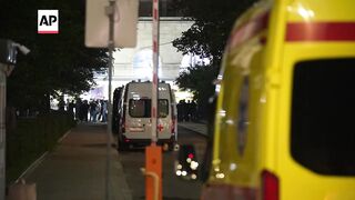 Ambulances and police at the scene in Moscow after bomb detonates at ​restaurant