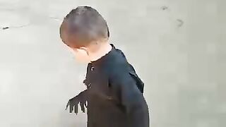 Kid with Hen