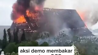 A demonstration outside the Indonesian Parliament building.”