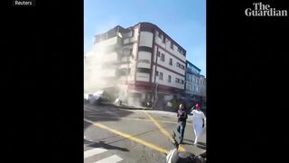 People flee as building collapses during earthquake in Colombia