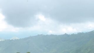 Beautiful Mountain Scenery Under the Clouds