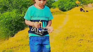 Cut boy smiling see the glass