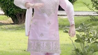 Cute girl dance in garden