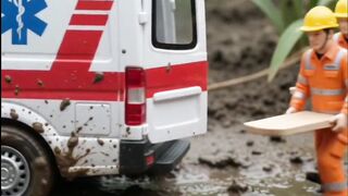 A tiny ambulance is stuck deep in the muddy road! 😱🌧️