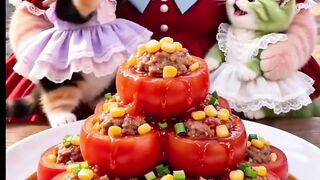 Ibu kucing memberi .akqn anaknya