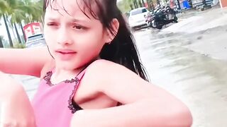 Small girl dance on road