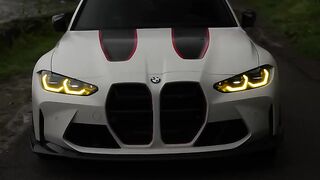White BMW M4 Sports Car Driving Near Suspension Bridge | Luxury Performance Car