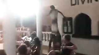 African acrobatic  stilt walker  show