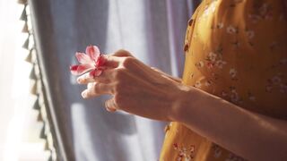 The Bold and the Beautiful - woman holding flower | Trending HD Video