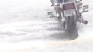 Motorcycles Trapped in a Massive Hailstorm