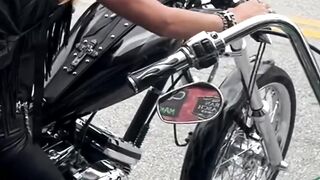 BIKER GIRL ON A CUSTOM HARLEY