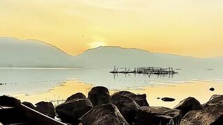 The beauty of the twilight glow by the shores of West Sumatra's largest lake...!