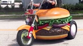 THE BURGER BIKE JUST ROLLED IN.