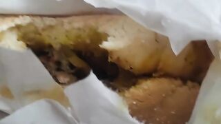 Is there a mantis‑man inside the bread?