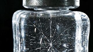 3D ice cube with fractal cracks formed under precision laboratory freezing process for scientific study