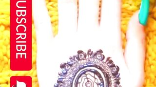 BEAUTIFUL GOL TIKKI MEHNDI DESIGN