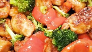 Easy Teriyaki Chicken (a.k.a Crack chicken) with broccoli and bell peppers.