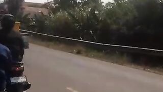 The road to the village has many public goods transportation.