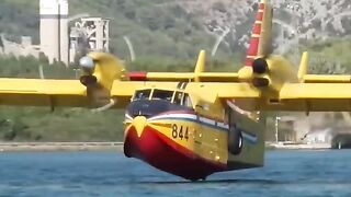 Canadair CL-415 Pilot Waving at Public while Scooping Water