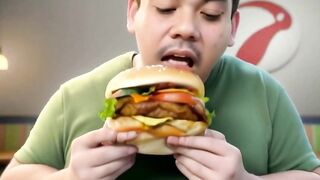 Man Eating Burger