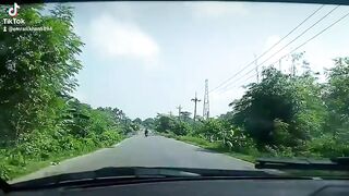 A peaceful ride through a beautiful countryside road.