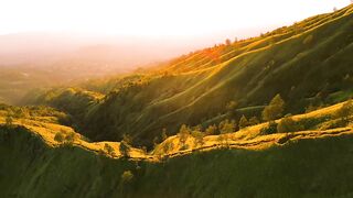 Golden Sunset Over the Green Hills 🌅🏞️
