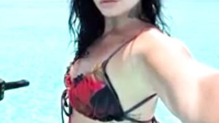 Demi Lovato Poses In Cheeky Floral Bikini