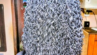 Cabelo feito com soltura dos cachos