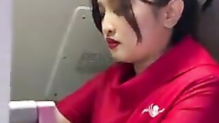 Beautiful wings air flight attendant serving coffee on board..mp4
