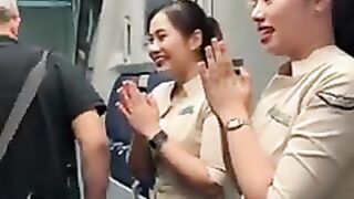 Friendly Super Air Jet flight attendant greeting passengers.mp4