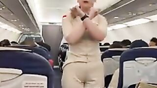 Beautiful flight attendant emergency exit safety briefing.mp4