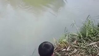 Kid: throws a stone at the crocodile 🪨🐊