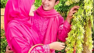 Beautiful muslim couple in pink — love & nature (atau) Romantic Islamic couple in pink with flowers