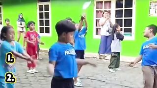 Funny moments of children participating in a competition.