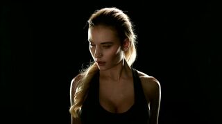 Fit Female Warming Up Before Workout