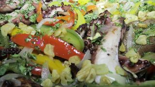 Roasted octopus with vegetables