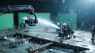 FILMMAKING CREW DESTROYING MINIATURE LANDMARK 2