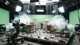 FILMMAKING CREW FILMING MINIATURE COASTAL STORM