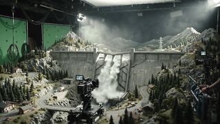 FILMMAKING MINIATURE DAM BURSTING IN VALLEY