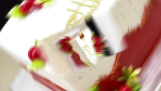 Elegant Red and White Birthday Cake with Beautiful Rose Decorations