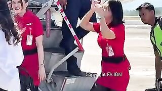 Beautiful flight attendant getting off the plane.mp4