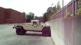 Humvee Climbing Vertical Wall.