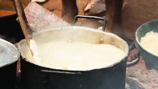 COOKING WITH CHARCOAL IN AFRICA ANGOLA