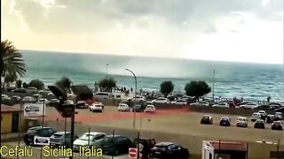 Tromba d'água vira tornado em praia italiana com fenômeno impressionante.