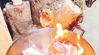 How to prepare a delicious charcoal-grilled pork recipe with egg, served with rice.