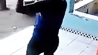 Drunken woman dancing ends up falling to the ground.